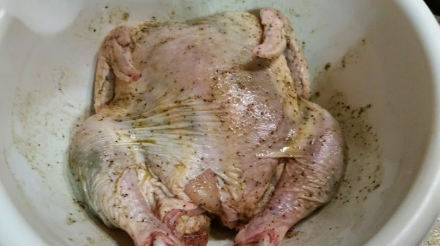 This bird has been thoroughly rubbed and massaged.  I would think it spoiled, but the chicken would probably disagree.